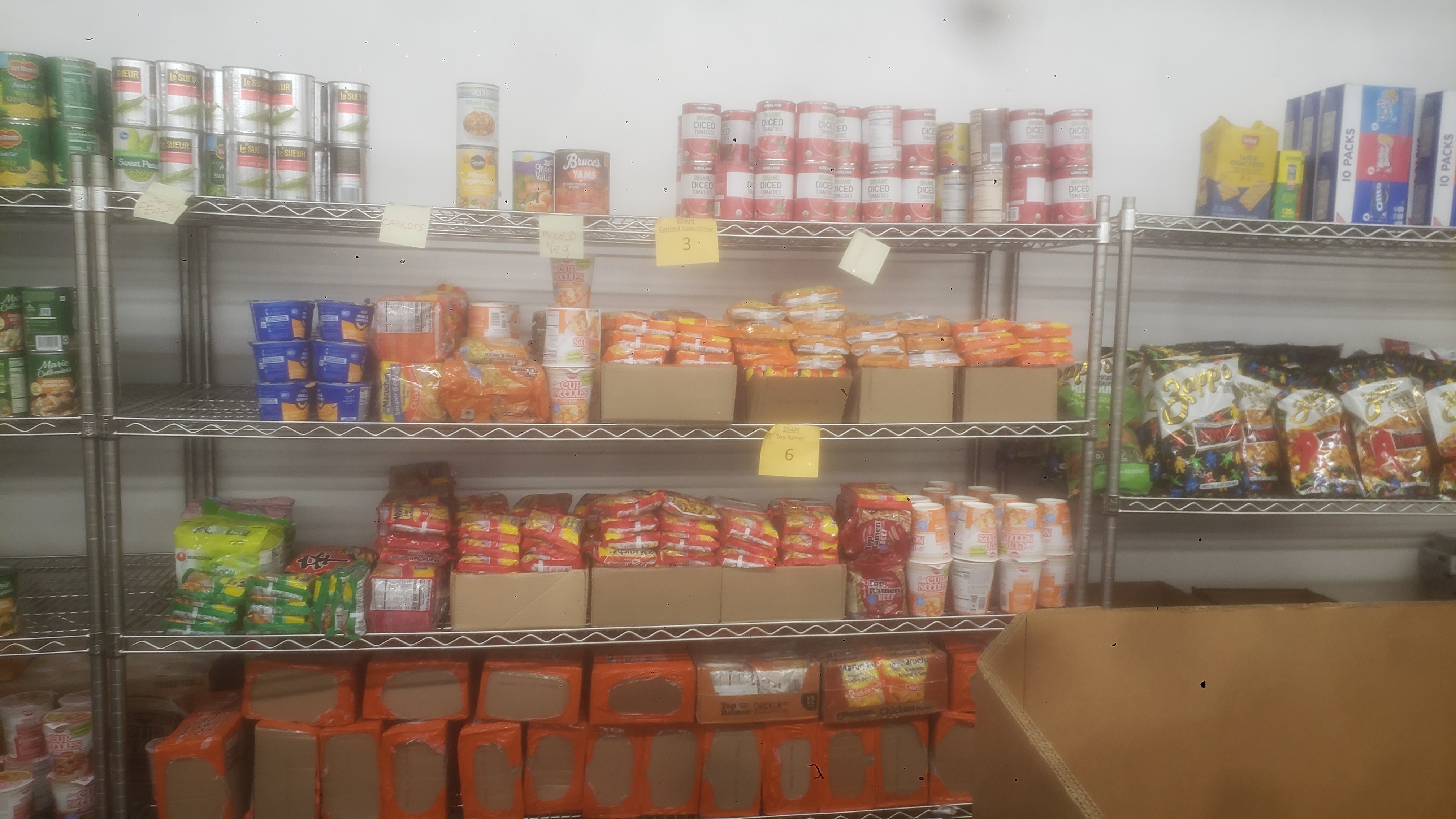 Food filled shelf.